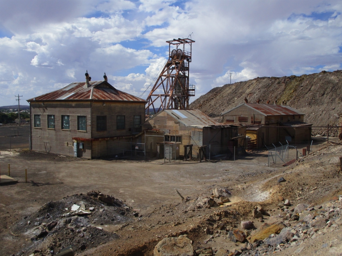 An abandoned mine in Kabwe, Zambia, where lead-rich mine tailing pipes litter the landscape.